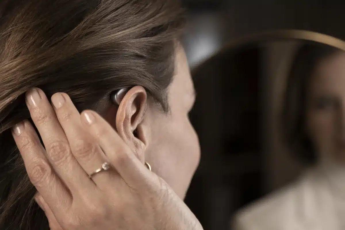 Widex hearing aid on woman