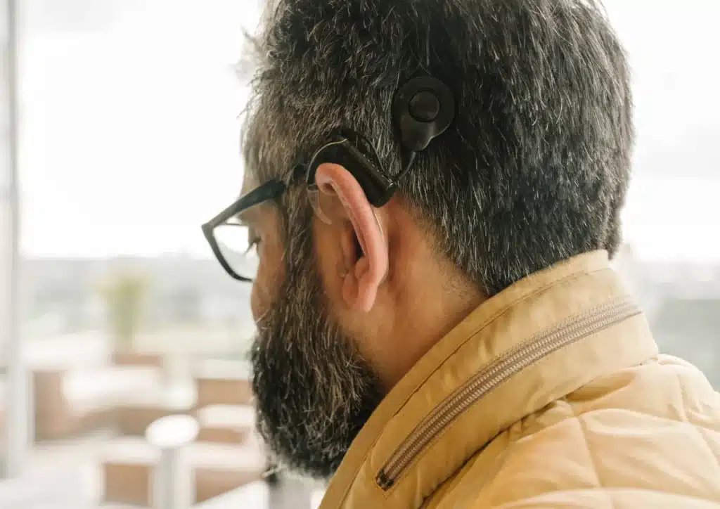 Understanding cochlear implants image of man with implant