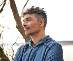 Man listening-Caring for Your Custom Hearing Aidst