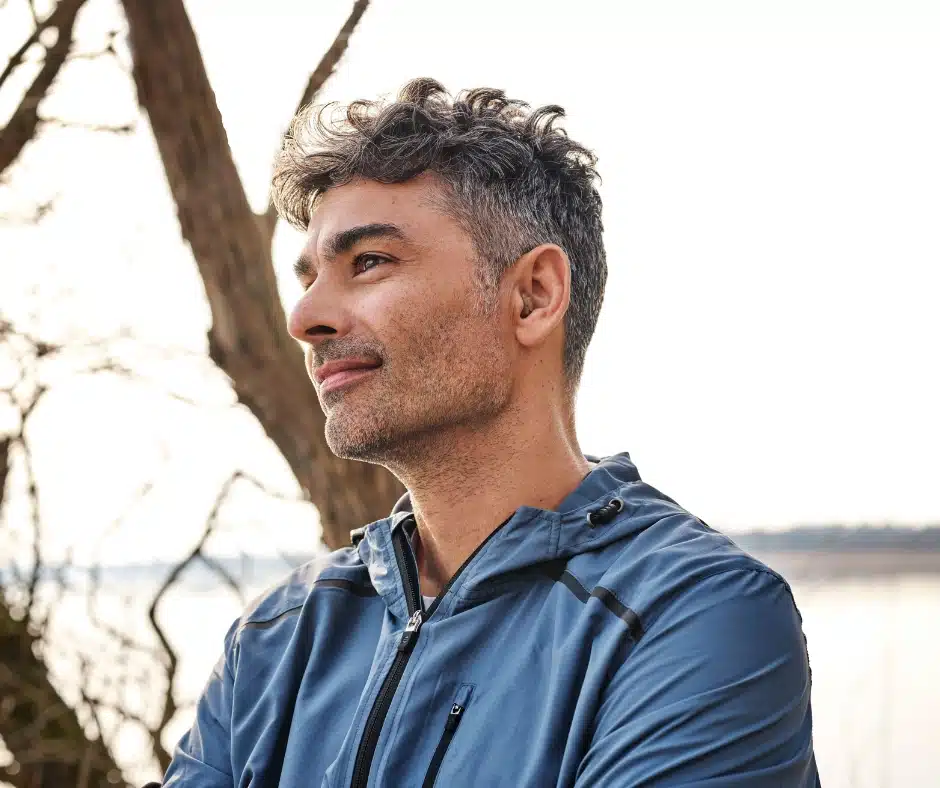 Man listening-Caring for Your Custom Hearing Aidst